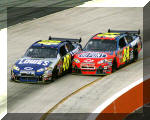 Jimmie Johnson makes contact with Jeff Gordoon